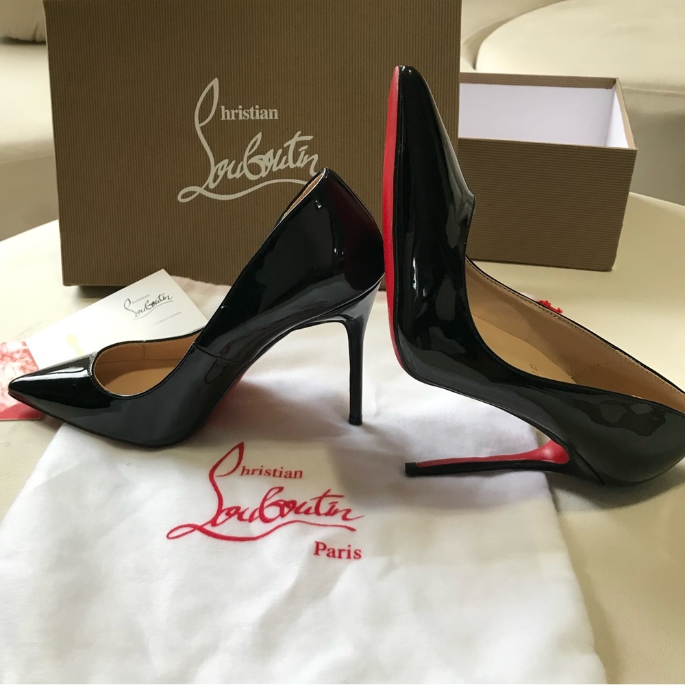 Size 37 , black LouBoutin red bottoms heels